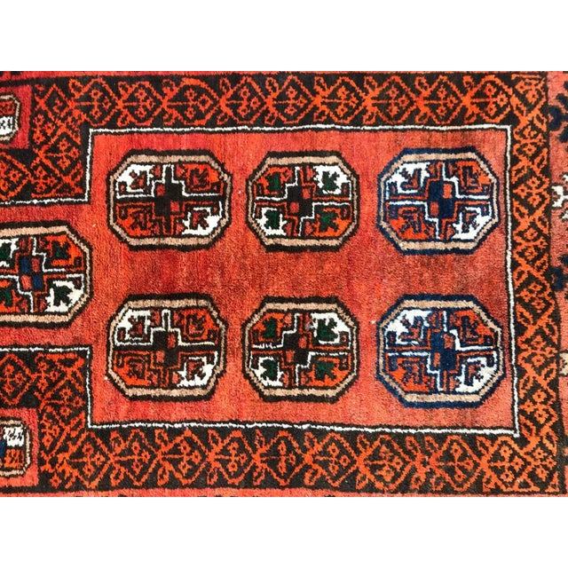 Mid-20th century Afghan rug, with beautiful prayer design and a red field color, wool velvet on wool foundations.
