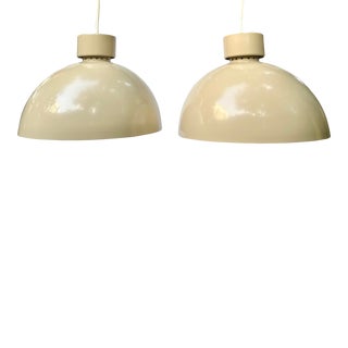 Pair 1960s Midcentury Modern Lightolier Beige Glossy Dome Pendant Lights For Sale