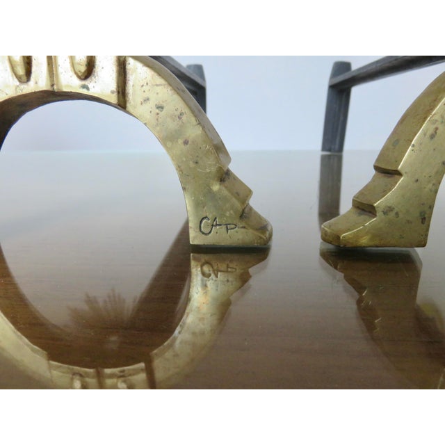 Pair of shaman andirons by Anton PRINNER. They are made of gilt bronze. 1930s.