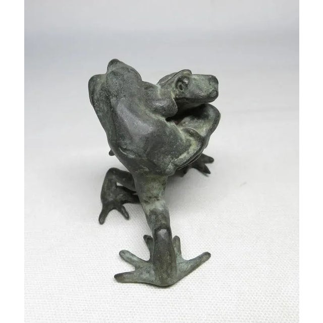 Two frogs are unusually depicted in a sumo match. A whimsical pair in copper with a marvelous patina, they grapple and...
