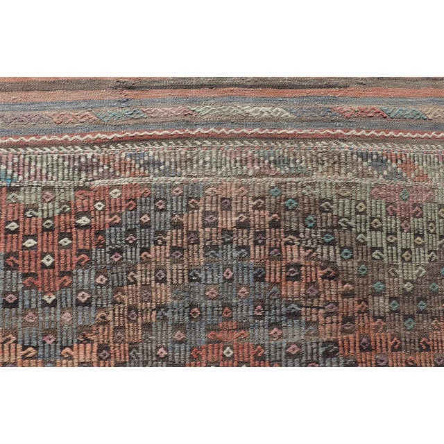 Tribal Mid 20th Century Mid 20th Century Softly Colored Turkish Vintage Embroidered Kilim Rug With Multi Layered Diamond For Sale - Image 3 of 11
