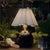 Compact yet striking, the Giorgio Mini Table Lamp is anchored by hand-blown black glass. Designed for versatility, it...