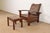 An exceptional Mission or Arts & Crafts bow arm reclining Morris lounge chair with ottoman Designed by Gustav Stickley...