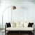 Add elegance and a touch of drama to your living room with this Mid-Century Modern style floor lamp. Slender, arching,...