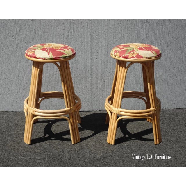 Gorgeous Barstools in Great Vintage Condition. Solid and Firm. The Fabric on both stools are frayed along the edges....