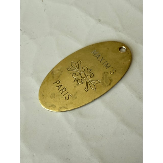 Maxim's Paris Brass Key Chain Fob/Purse Charm by Lowell Sigmund For Sale - Image 4 of 6