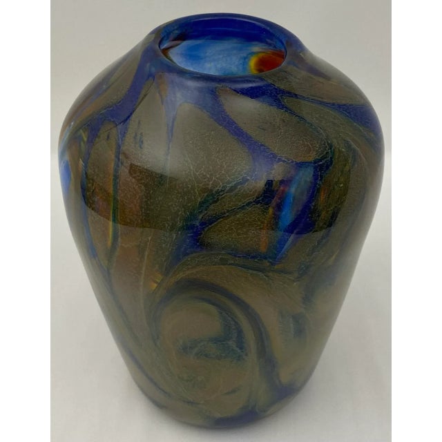 Elegantly designed Murano art glass vase attributed to Fratelli Toso . This Murano art glass vase is perfect for...
