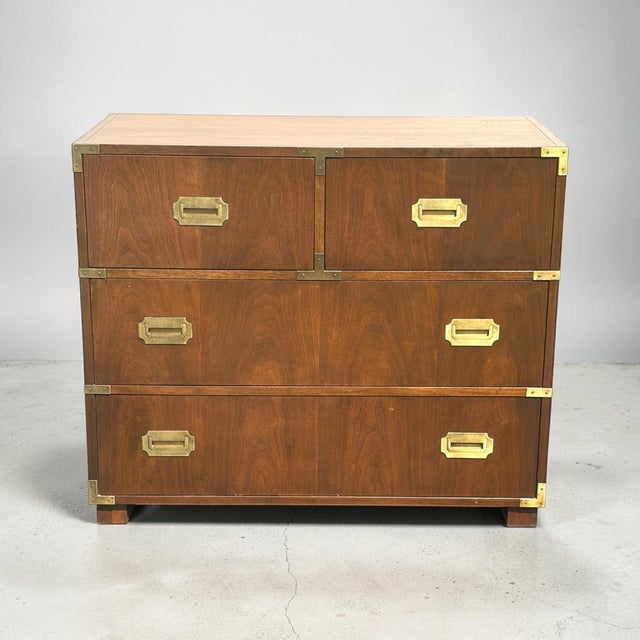 A beautiful 4 drawer chest of drawers. 2 over 2 larger drawers. Designed by Michael Taylor. Made of walnut with inset...