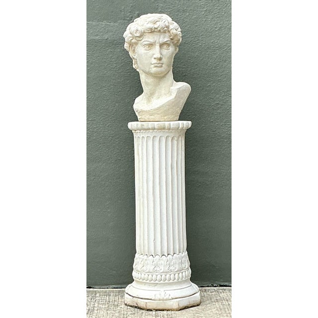 This magnificent vintage ensemble features a classic cast concrete bust of Michelangelo’s David poised atop an intricately...