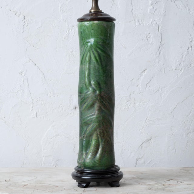 A chinoiserie ceramic green bamboo vase mounted as lamp, mid-20th century. 4 ¼ inches wide at base by 24 ½ inches tall; 13...