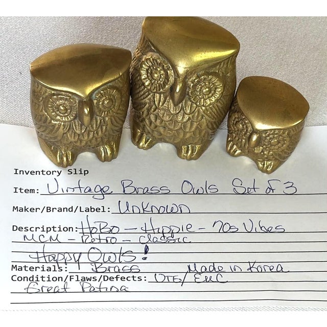 Vintage brass owl figurines in a graduated set of three bring a touch of mid-century modern charm to any shelf or desk....