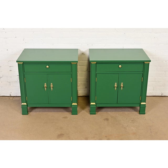 A gorgeous pair of French Empire style nightstands or end tables By Baker Furniture USA, Circa 1960s Green lacquered...