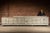 Extraordinary, nearly sixteen-foot-long industrial shop cabinet constructed in heavy pine and plywood with a thick, paint-...