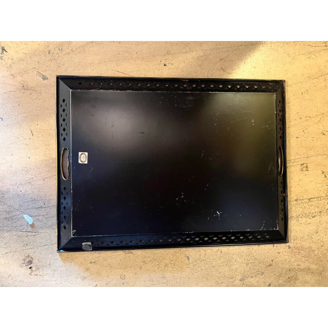 Vintage mid-century hand painted floral metal tray. A vintage toleware tray has the sides with open punch work except for...