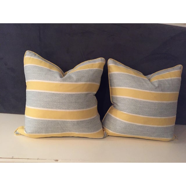 Yellow and blue stripes makes these pillows fun to have around. Well-made with zippers and self welt. These are just the...