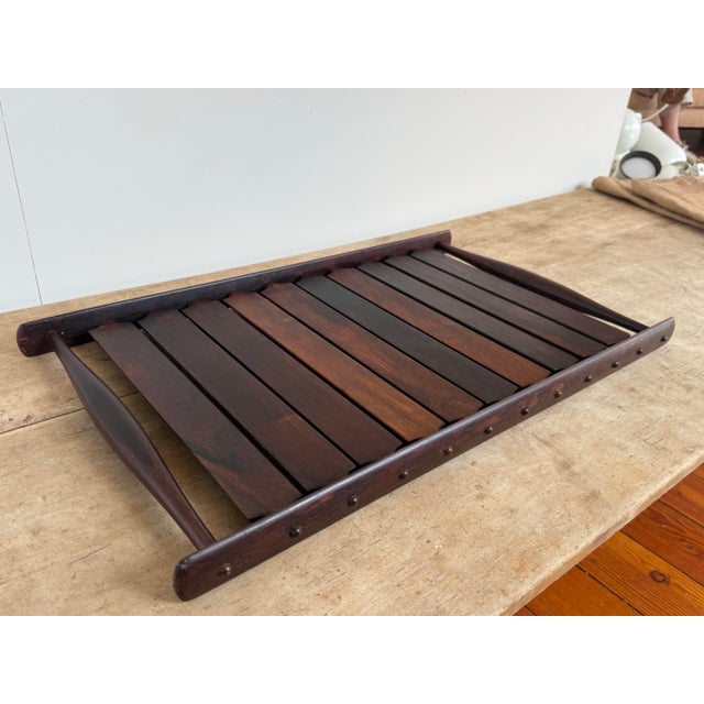 This is a Jens Quistgaard “Xylofon” Brazilian Rosewood serving tray for Dansk Designs from the “Rare Woods”series, circa...