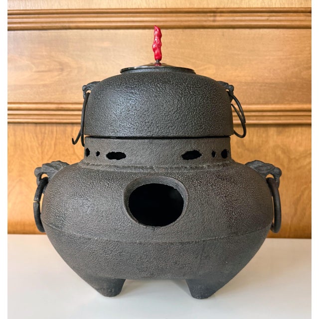 A fine two-piece set of Japanese Chagama, a central piece used as a kettle to boil water for chanoyu (tea ceremony). The...