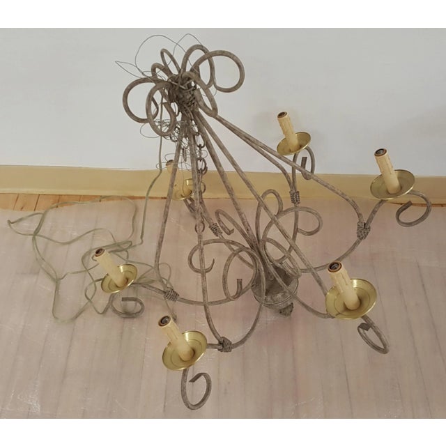Showroom Floor Sample of lovely chandelier. Never been used. 6 candle holders/electric Iron and brass Original Retail...