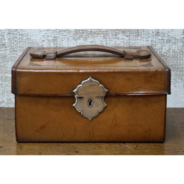 A superb small leather travel stationary box. Made from leather, with compartments for all your stationary needs while...