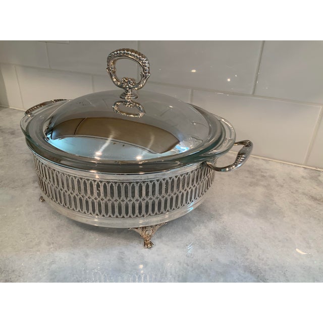 Footed silver lidded serving dish with Pyrex insert. Made by WA Italy.