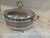 Footed silver lidded serving dish with Pyrex insert. Made by WA Italy.