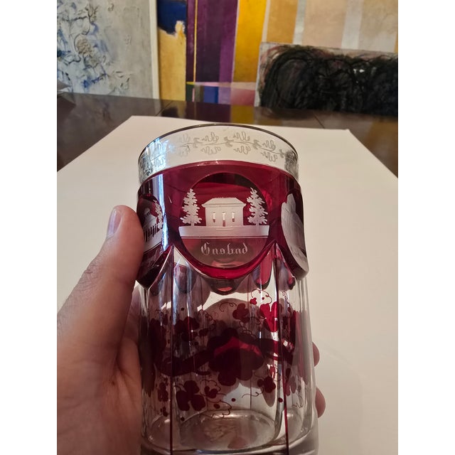 A good antique over 100 years old collector's art glass goblet. Having a cranberry to clear color with hand etched panels...