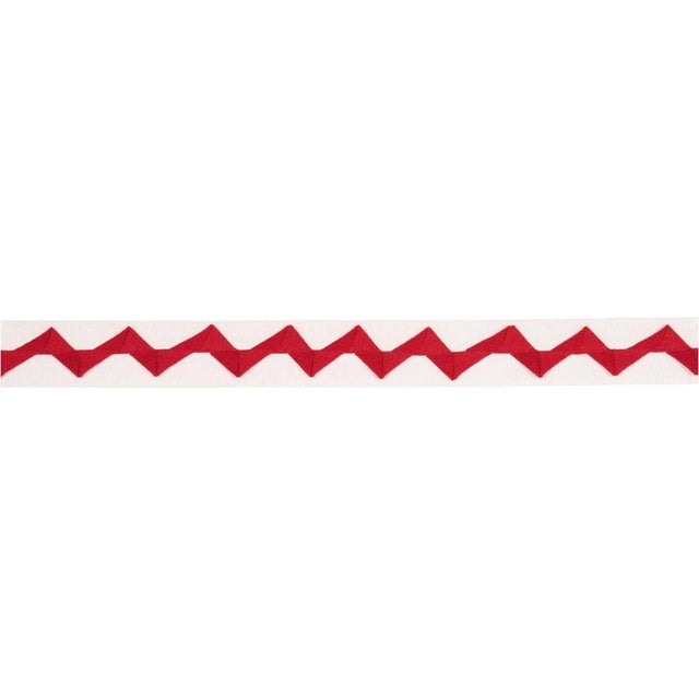 Grosgrain ribbon is folded into zigzag bands and sewn onto a linen ground to create Lazare Appliqué Tape, a truly unique...