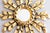 A charming petite Mid-Century Italian giltwood sunburst or starburst mirror with lovely gilt patina and finely carved...