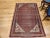 This authentic vintage Persian Malayer area rug features an elegant allover paisley motif, a design long associated with...