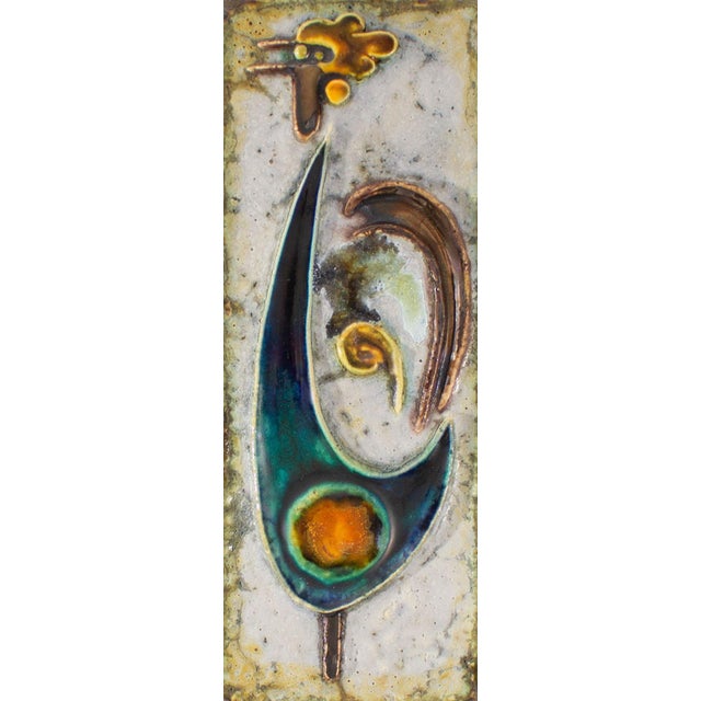 A ceramic wall tile plaque by the German artist Helmut Friedrich Schäffenacker (1921-2010). The rectangular tile has an...