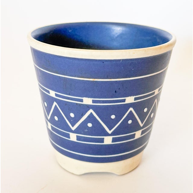 Charming little Danish Modern Soholm pottery cachepot. The white clay base is hand painted with a vibrant royal blue with...