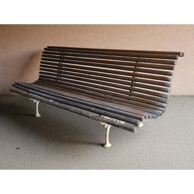 Garden bench / Art Nouveau cast iron legs / Wooden slats in very good condition (no wood decay) The bench is 2 meters...