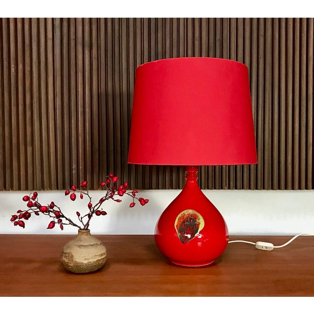This fine table lamp was designed by the Danish artist, ceramicist and illustrator Bjørn Wiinblad. It was manufactured in...