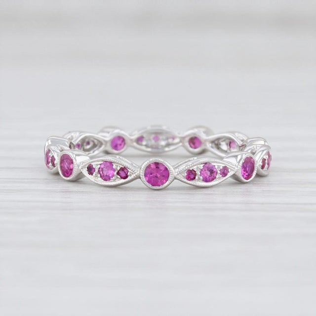 Gem: Natural Rubies - 0.63 Total Carats, Round Brilliant Cut, Red Color, Routinely Enhanced Metal: 14k White Gold Weight:...