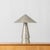 Inspired by antiquities, the Foxton table lamp cuts a bold figure with artistic geometry and textural finishes. The...