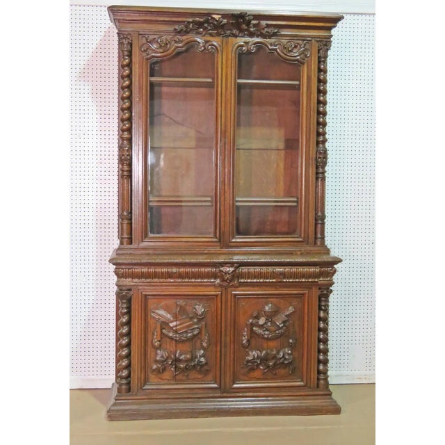 2 drawers. 3 shelves on top with 2 glass doors. 2 doors at bottom. 90 3/4" h x 51 7/8" w x 21" d. Condition Chips in wood....