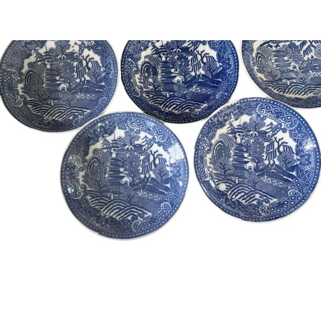 Vintage Blue and White Willow Pattern Japanese set of 7 plates measure 6" Diameter by 1" H Features the classic blue...