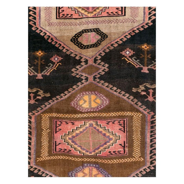 A vintage Turkish Anatolian tribal room size carpet handmade during the mid-20th century. Measures: 7' 11" x 12' 1"