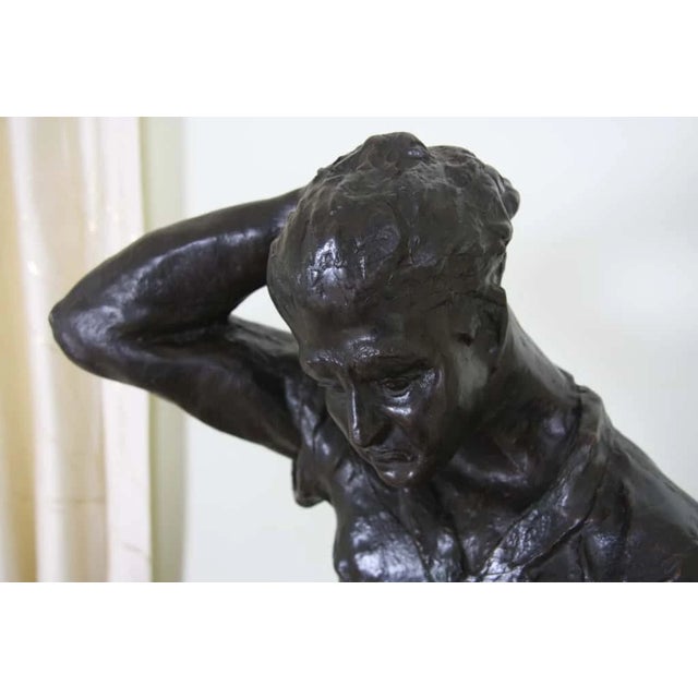 Original bronze statue. Only one piece. 1934. Beautiful patina. Table included. Figure of a thoughtful man. Man in high...