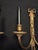 Presented here are a pair of exquisite late 20th-century brass wall sconces, tastefully adorned with captivating bows,...