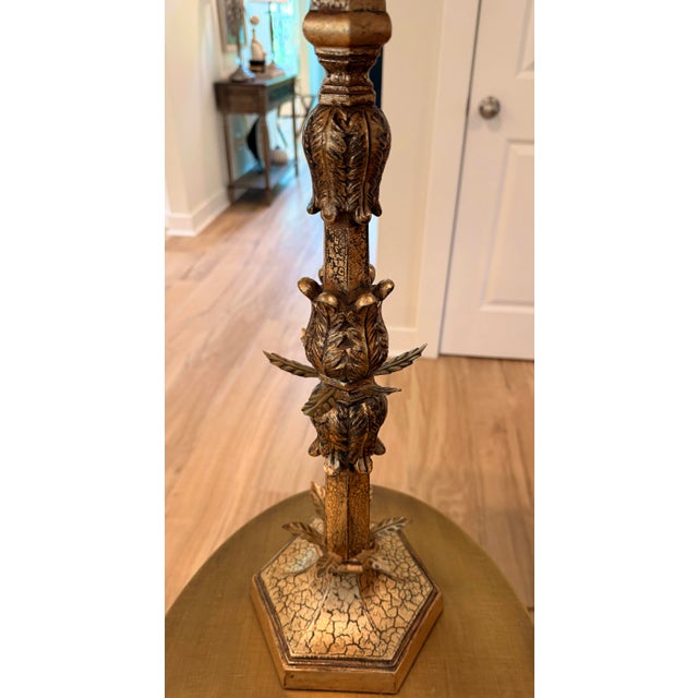 Richly textured antiqued gold finish and dramatic crackle detailing. The slender column is adorned with ornate acanthus...