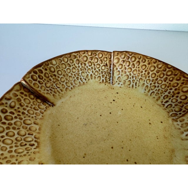 We offer for sale today this fantastic Vintage organic beige glaze artistic decorative studio pottery plate. Signed on the...