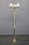 This original floor lamp was produced in czechoslovakia during the 1970s. The design features a brass-finished metal...