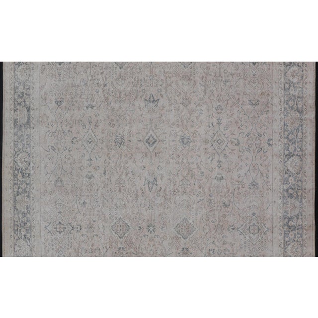 Measures: 9'5 x 11'10 Vintage Turkish Oushak Rug, Distressed Floral Design, Cream & Blue 9'5 X 11'10. Keivan Woven Arts...