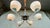 Very nice chandelier in art deco style. It has a chrome holder with a slight patina. 6 light elements made of cream glass...