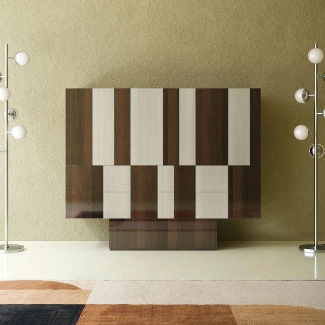 The Ruskin Cabinet merges contemporary minimalism with traditional craftsmanship, creating a piece that discreetly...