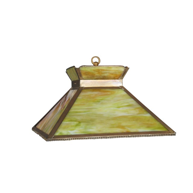 Late 19th-early 20th century Arts and Crafts mission style swag / pendant light. Pyramid shaped with flared top, trimmed...