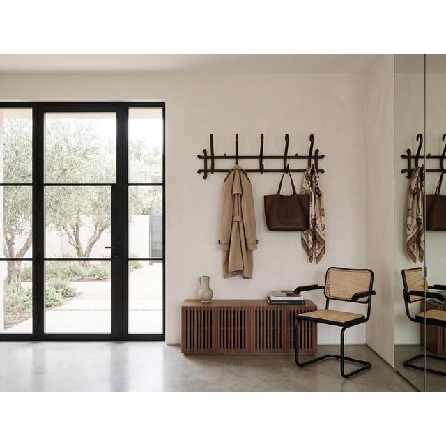 Highly elegant antique wall-mounted bentwood coat rack, model No. 1, manufactured by the world-renowned firm Gebrüder...
