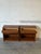 Clean linear silhouette features open shelving compartments beneath top drawers for versatile storage. Showcases warm teak...