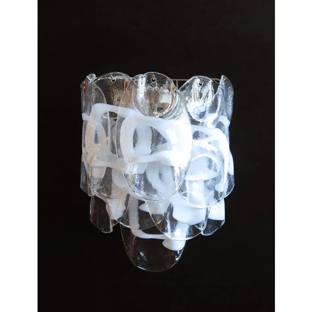 AVAILABLE IN ROSE AS WELL Italian Murano appliques in Vistosi style. This sconce has 10 fantastic Murano white lattimo and...